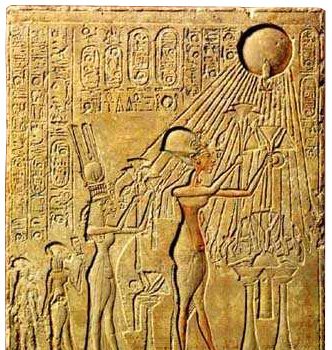 Stela from El-Amarna, Egyptian King Akhenaten is seen with his wife Nefertiti and their daughters bearing offerings to the sun-disk Aten.