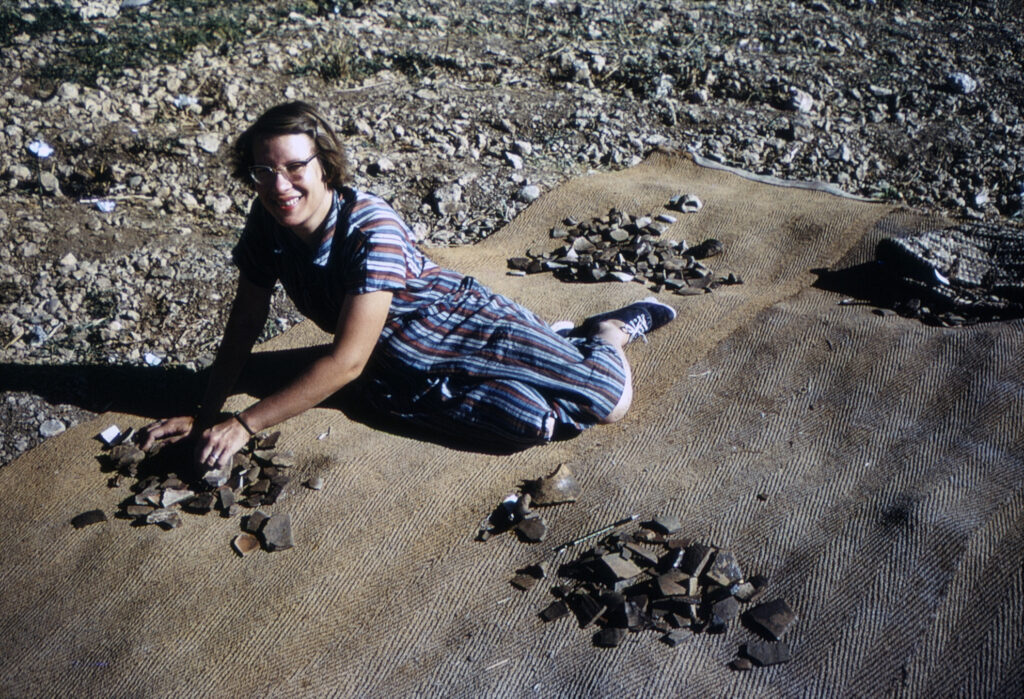 Nancy Lapp sorting pottery at Iraq al-Amir, Jordan, in 1962. Paul and Nancy Lapp Collection, 1962. Courtesy ACOR, Amman.